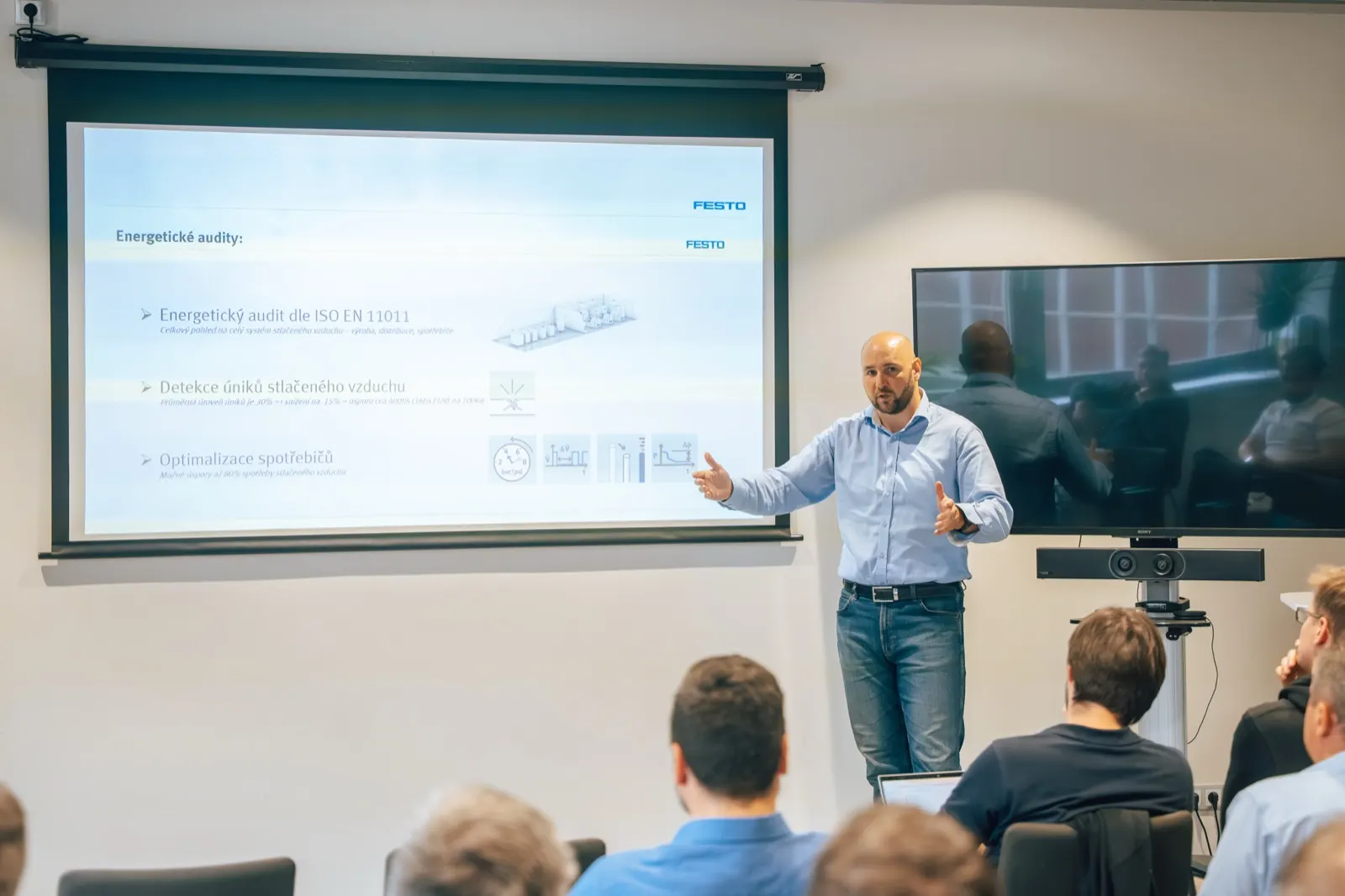 Speaker walking the audience through a topic at a previous Edmund AI Day